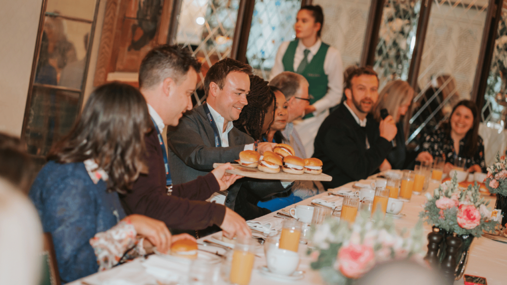 Pushfar CEO Ed Johnson digging into some breakfast while talking the power of purpose